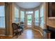 Bright breakfast nook featuring a small table, two chairs and a view to the back yard at 3474 Glen Abbe Ct, Carmel, IN 46032