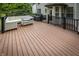 Spacious outdoor deck is furnished with patio furniture and a grill for outdoor dining at 3474 Glen Abbe Ct, Carmel, IN 46032