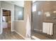 Modern bathroom featuring a spacious glass shower and a large walk-in closet at 3606 Evergreen Way, Zionsville, IN 46077
