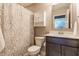 Bathroom with patterned shower curtain, vanity, and wall cabinet at 3606 Evergreen Way, Zionsville, IN 46077