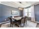 Elegant dining room featuring modern lighting and ample seating at 3606 Evergreen Way, Zionsville, IN 46077
