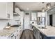 Bright kitchen equipped with modern appliances, granite countertops, and ample cabinet space, ideal for Gathering meals at 3606 Evergreen Way, Zionsville, IN 46077