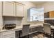 Bright office space featuring granite countertops, custom cabinets, and modern decor at 3606 Evergreen Way, Zionsville, IN 46077