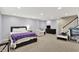 Finished basement offering a bed, seating area, and a play area at 3740 Weather Stone Xing, Zionsville, IN 46077