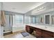 Spacious bathroom features a dual sink vanity, large tub, and glass shower at 3740 Weather Stone Xing, Zionsville, IN 46077