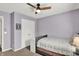 Comfortable bedroom with a ceiling fan, carpet, a double door closet and a window at 3740 Weather Stone Xing, Zionsville, IN 46077