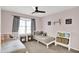 room with two beds, ceiling fan, plush carpet, and plenty of space for activities at 3740 Weather Stone Xing, Zionsville, IN 46077