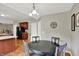 Dining room with hardwood floors conveniently located near kitchen at 3740 Weather Stone Xing, Zionsville, IN 46077