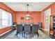 Stylish dining room features a large table, upholstered chairs, and a modern light fixture at 3740 Weather Stone Xing, Zionsville, IN 46077