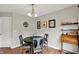 Dining room features hardwood floors and a view of backyard at 3740 Weather Stone Xing, Zionsville, IN 46077