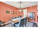Dining room featuring seating for eight, decorative wall art, and modern lighting at 3740 Weather Stone Xing, Zionsville, IN 46077
