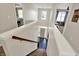 Bright and airy entryway with hardwood floors, lots of natural light, and staircase leading upstairs at 3740 Weather Stone Xing, Zionsville, IN 46077