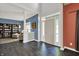 Spacious foyer with hardwood floors and views of the living room and staircase at 3740 Weather Stone Xing, Zionsville, IN 46077