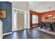 Inviting foyer with hardwood floors and views to the dining room and front door at 3740 Weather Stone Xing, Zionsville, IN 46077