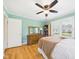 This bedroom has wood floors and two windows at 3809 N Glenwood Ave, Muncie, IN 47304