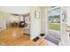 Welcoming foyer with hardwood floors leading to a spacious living area at 3809 N Glenwood Ave, Muncie, IN 47304