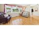 Comfortable living room with a bright window and classic decor at 3809 N Glenwood Ave, Muncie, IN 47304