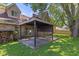 Backyard patio featuring a gazebo, ideal for outdoor entertaining and relaxation in a private setting at 396 W 500 S, Anderson, IN 46013