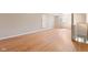 Unfinished basement with light gray walls, light fixture and hardwood flooring at 396 W 500 S, Anderson, IN 46013