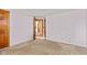 Spacious bedroom featuring neutral carpet, two entryways, and light pink walls at 396 W 500 S, Anderson, IN 46013