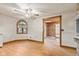 Dining area featuring hardwood floors and a unique window with natural light at 396 W 500 S, Anderson, IN 46013