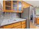 Kitchen with stainless steel refrigerator, granite countertop, and a decorative backsplash at 396 W 500 S, Anderson, IN 46013