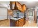 Bright eat-in kitchen featuring a granite island, modern appliances, and beautiful hardwood floors at 396 W 500 S, Anderson, IN 46013