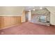 Bright living room with brick fireplace and neutral color palette at 396 W 500 S, Anderson, IN 46013