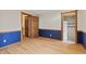 Room featuring hardwood floors, chair railing, and wooden trim at 396 W 500 S, Anderson, IN 46013