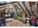 A spacious attic with insulation, wooden beams, and potential for storage or customization at 4046 N Park Ave, Indianapolis, IN 46205
