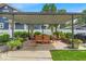 Cozy covered patio with seating, great for outdoor entertaining at 4046 N Park Ave, Indianapolis, IN 46205
