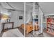 Finished basement bedroom featuring a cozy bed and open ceiling design at 4046 N Park Ave, Indianapolis, IN 46205