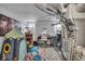 This basement features a finished playroom with a desk and utility area at 4046 N Park Ave, Indianapolis, IN 46205