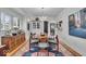 Stylish dining room with decor and blue patterned rug at 4046 N Park Ave, Indianapolis, IN 46205