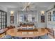 Bright dining room with a modern light fixture and wood table at 4046 N Park Ave, Indianapolis, IN 46205