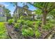 Charming home with a well-landscaped front yard and mature trees creating a serene setting at 4046 N Park Ave, Indianapolis, IN 46205