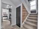 Hallway with stairs and partial view of the kitchen at 4046 N Park Ave, Indianapolis, IN 46205