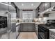 Kitchen with stainless steel appliances, gas range, and granite countertops at 4046 N Park Ave, Indianapolis, IN 46205