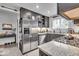 Modern kitchen with granite countertops, stainless steel appliances and gray cabinets at 4046 N Park Ave, Indianapolis, IN 46205