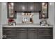 Kitchen featuring gray cabinets with glass fronts and granite countertops at 4046 N Park Ave, Indianapolis, IN 46205
