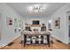 Spacious living room featuring hardwood floors, modern lighting, and stylish decor at 4046 N Park Ave, Indianapolis, IN 46205