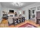 Bright living room with hardwood floors, fireplace, and modern lighting at 4046 N Park Ave, Indianapolis, IN 46205