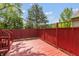 Wooden back deck featuring a wooden fence and steps leading down to the lawn at 4291 Caledonia Way, Indianapolis, IN 46254