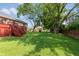 Expansive backyard with a well-maintained lawn and a spacious back deck area at 4291 Caledonia Way, Indianapolis, IN 46254