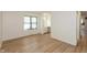 Bright bedroom featuring a view to the vanity area with warm lighting at 4291 Caledonia Way, Indianapolis, IN 46254