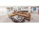 Comfortable finished basement with a plush sectional sofa, ottoman, and plenty of space for relaxation or entertainment at 4431 Cranbrook Dr, Indianapolis, IN 46250