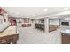 Finished basement features a bar, gaming area, and entertainment space with cozy seating and a large screen at 4431 Cranbrook Dr, Indianapolis, IN 46250