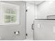 Modern shower room features white subway tile and glass door at 4431 Cranbrook Dr, Indianapolis, IN 46250
