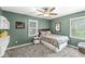 Cozy bedroom with a ceiling fan, natural light, and a modern design, perfect for a or guest at 4431 Cranbrook Dr, Indianapolis, IN 46250