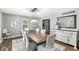 Formal dining room featuring light grey walls, hardwood floors and modern decor at 4431 Cranbrook Dr, Indianapolis, IN 46250